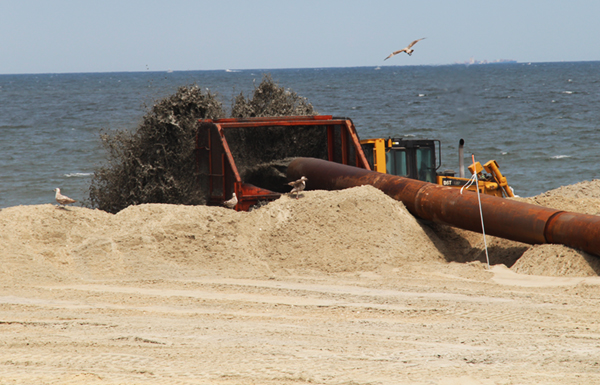 Dredging activities for beach nourishment after Superstorm Sandy