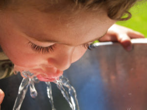 Thirsty, Child drinking  from fountain